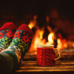 feet-by-fireplace_1350x900-690×518.jpg